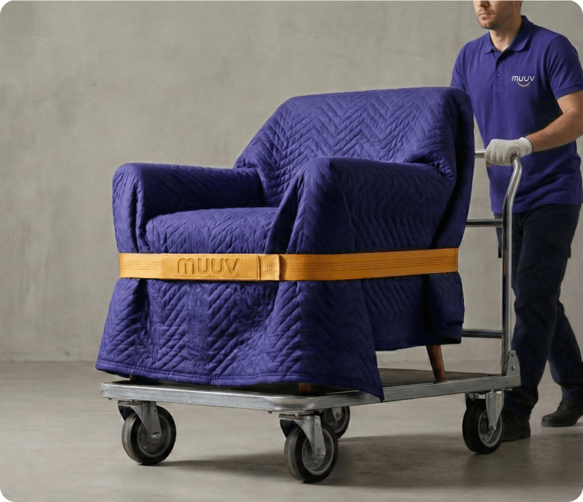 Professional mover transporting furniture